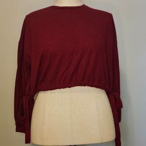 Fuzzy cropped side-tie cinch sweater
